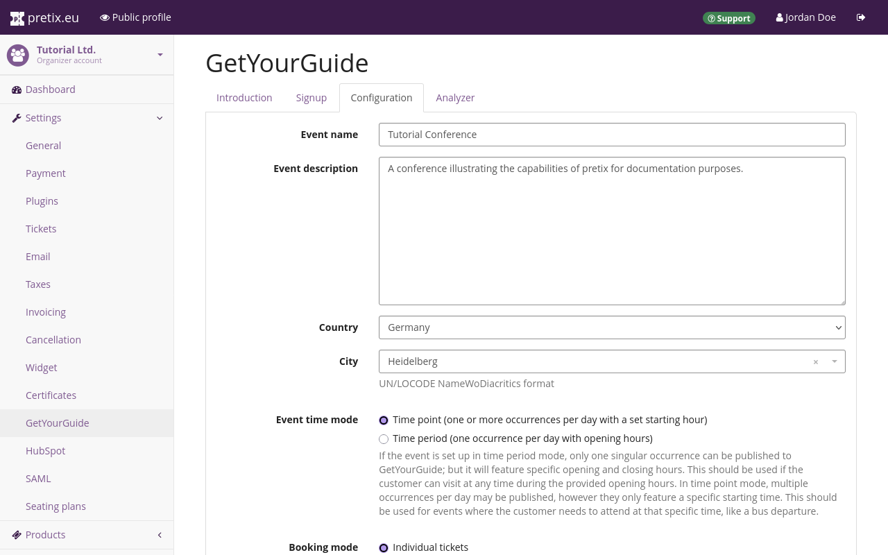 Page titled 'GetYourGuide', on the 'Configuration' tab. Fields labeled 'event name', 'Event description', 'Country' and 'City' are filled out. Under 'Event time mode', the option 'Time point' is active. Under 'Booking mode', the option 'Individual tickets' is active.