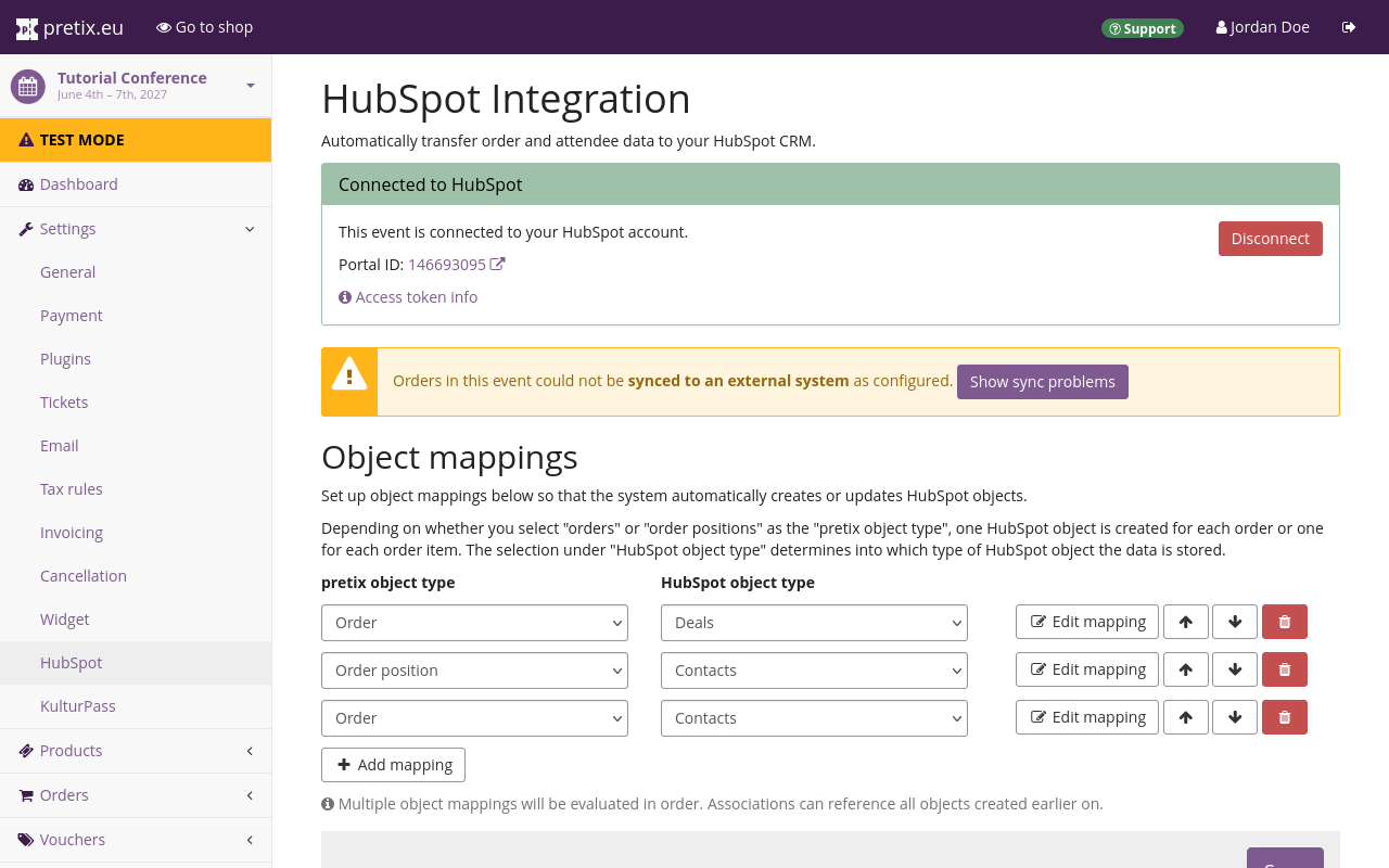 Page titled 'HubSpot Integration', displaying, among other things, a yellow warning box with the text 'Orders in this event could not be synced to an external system as configured' and a purple button labeled 'Show sync problems'. 