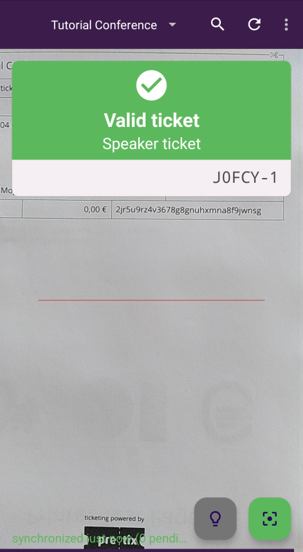 Valid ticket screenshot Scanning a ticket in pretixSCAN. A green box appears at the top of the screen, displaying a checkmark, the text: "Valid ticket (Speaker ticket)" and the order code suffixed with "-1".