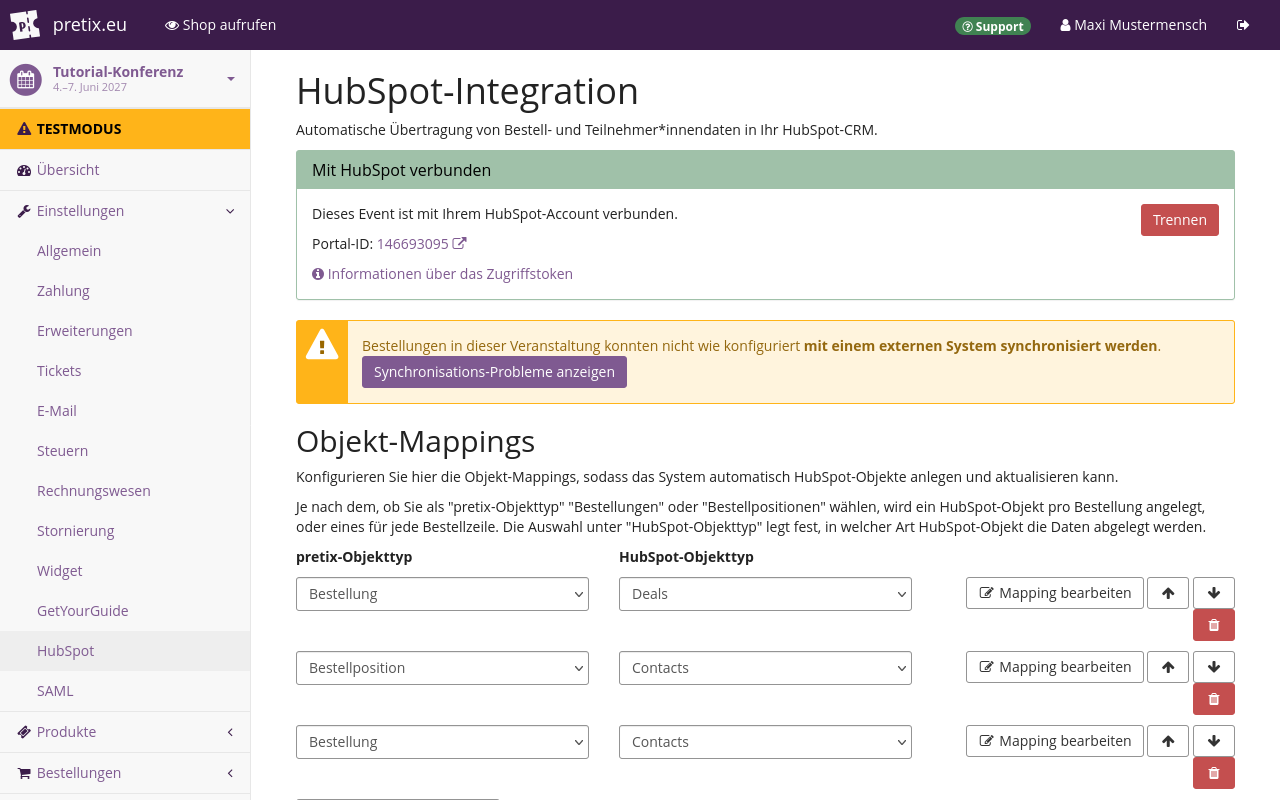 Die Seite 'HubSpot-Integration' zeigt unter anderem einen gelben Kasten mit der Warnung 'Bestellungen in dieser Veranstaltung konnten nicht wie konfiguriert mit einem externen System synchronisiert werden' sowie einen violetten Button mit der Aufschrift 'Synchronisations-Probleme anzeigen'.